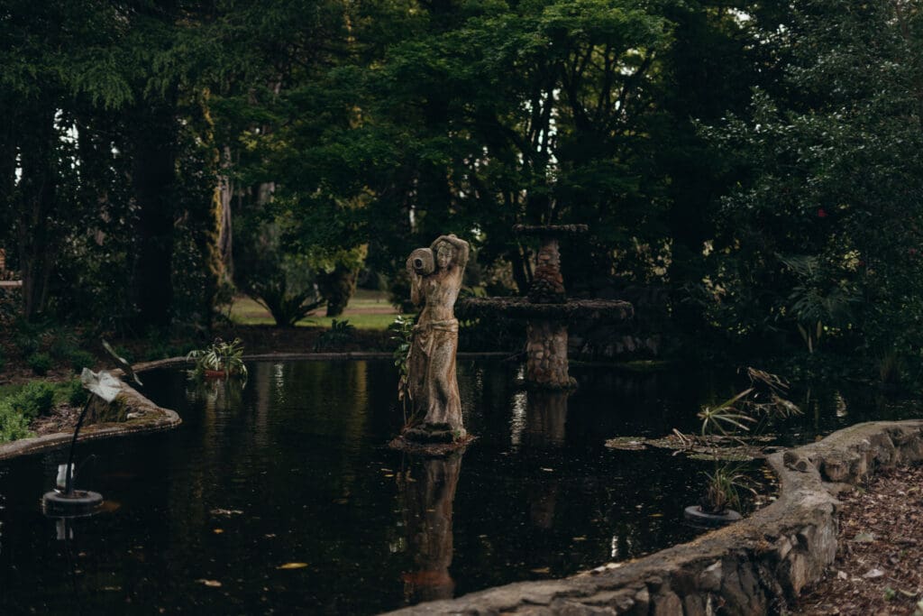 Stone water fountain surrounded by immaculate lawns at Glenfyne Weddings in Gippsland, photo by Ebb and Flow Photography